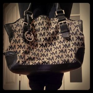 Michael Kors black leather handbag